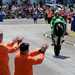 A racer celebrates with a wheelie in Enniskillen