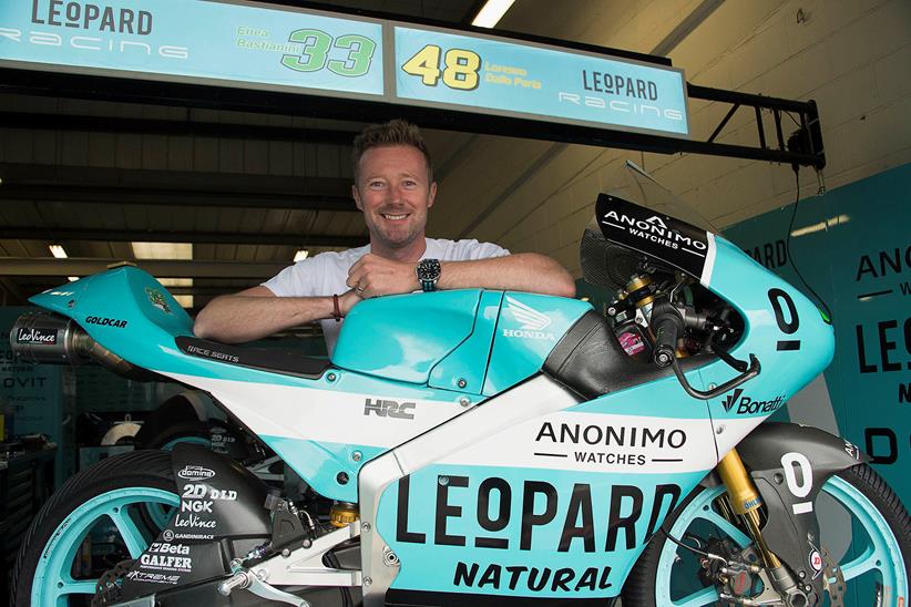 Shedden stands with a Leopard Racing Moto3 bike