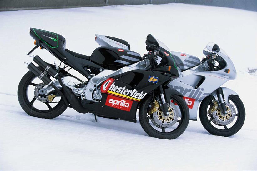 A pair of Aprilia RS250s brave the winter chill