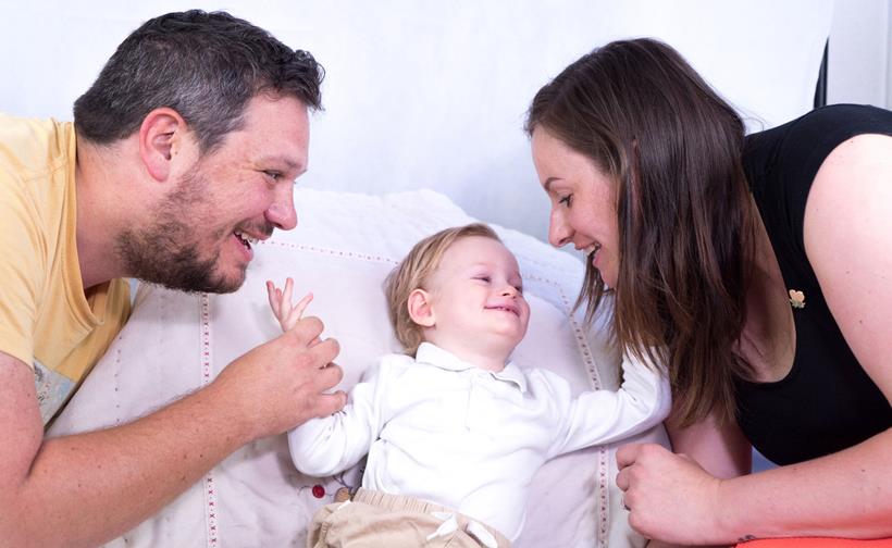 Parents Xavier and Corinne with Henri