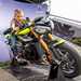 Young visitor tries a Triumph Street Triple for size at the 2023 MCN Festival of Motorcycling
