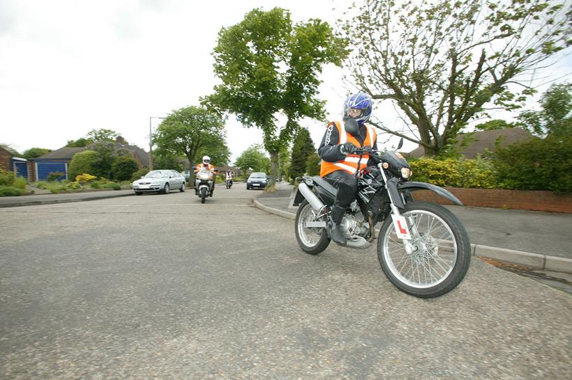 Part of the module 2 motorcycle test involves on-road riding