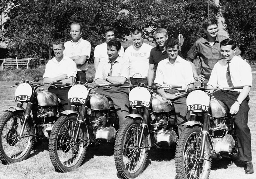 Steve McQueen (centre) with a fleet of Triumphs