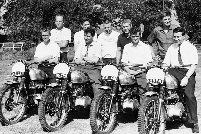 Steve McQueen (centre) with a fleet of Triumphs