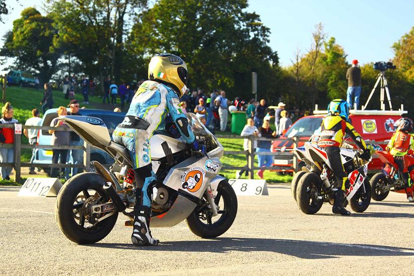 A young rider prepares to race