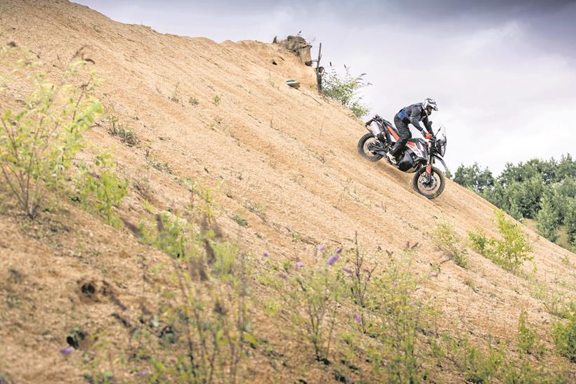 Heading down hill off-road aboard the KTM 790 Adventure R