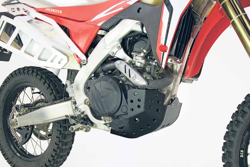 A bash plate protects the Honda CRF450L