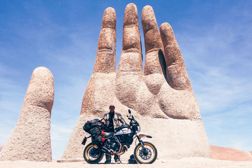 Henry Crew in the desert while riding his Desert Sled around the world