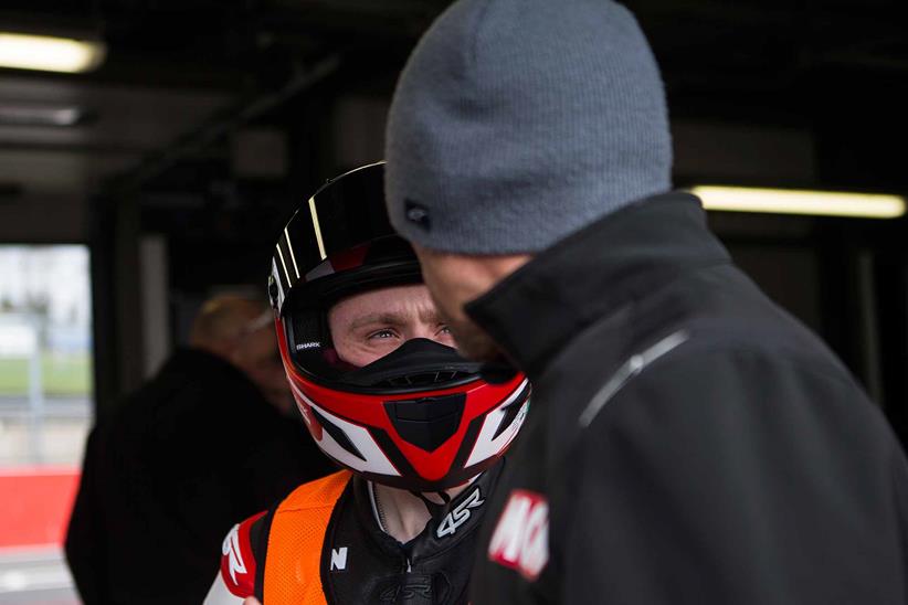 Mid-discussion in the garage