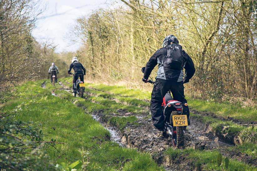 Standing up is a good idea when riding off road, as you can see more and allow the bike to move around underneath you