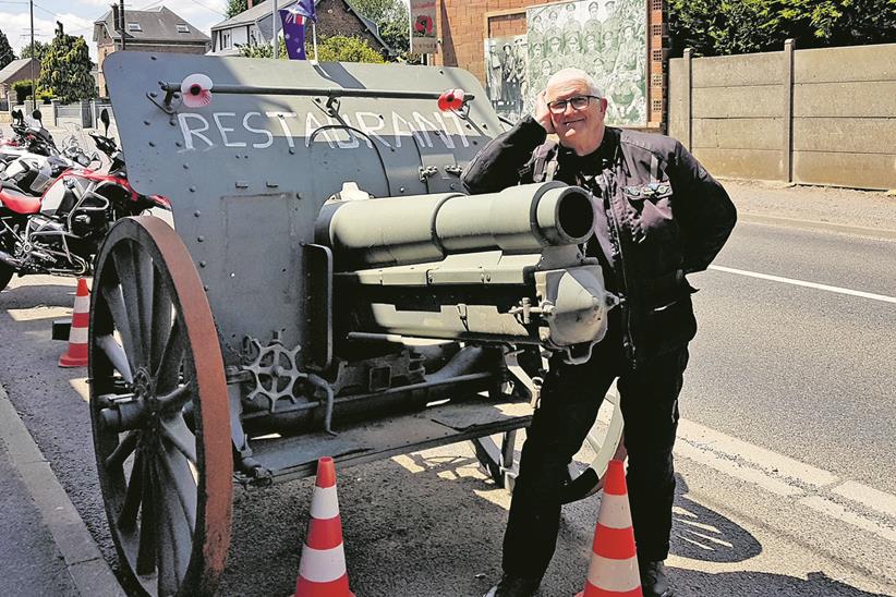 Philip Weston posing with artillery