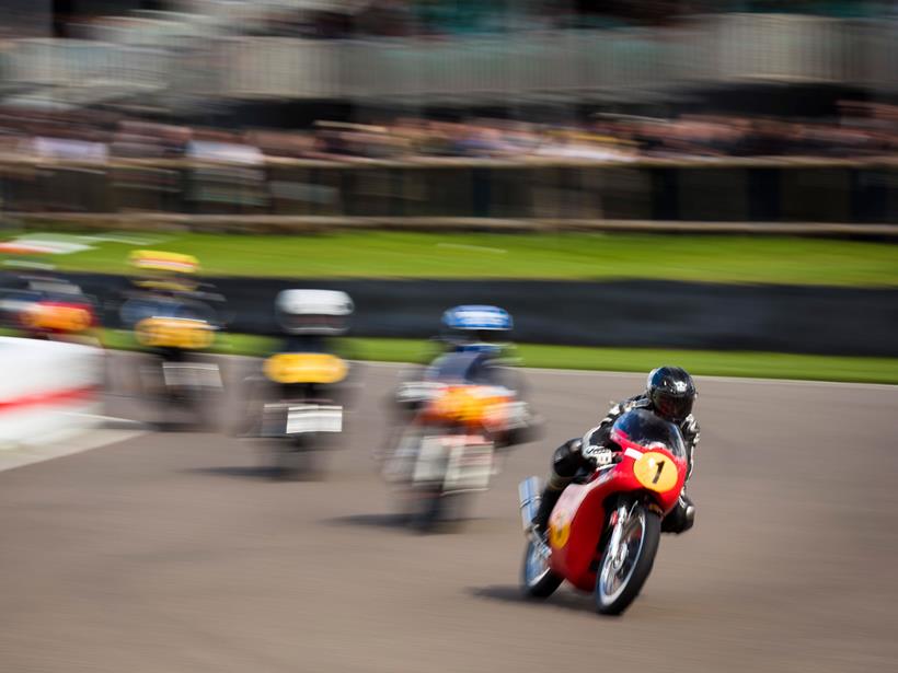 The Goodwood Revival is a great place to see old bikes racing closely together. Picture credit: Drew Gibson/Goodwood