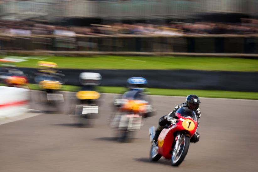 The Goodwood Revival is a great place to see old bikes racing closely together. Picture credit: Drew Gibson/Goodwood