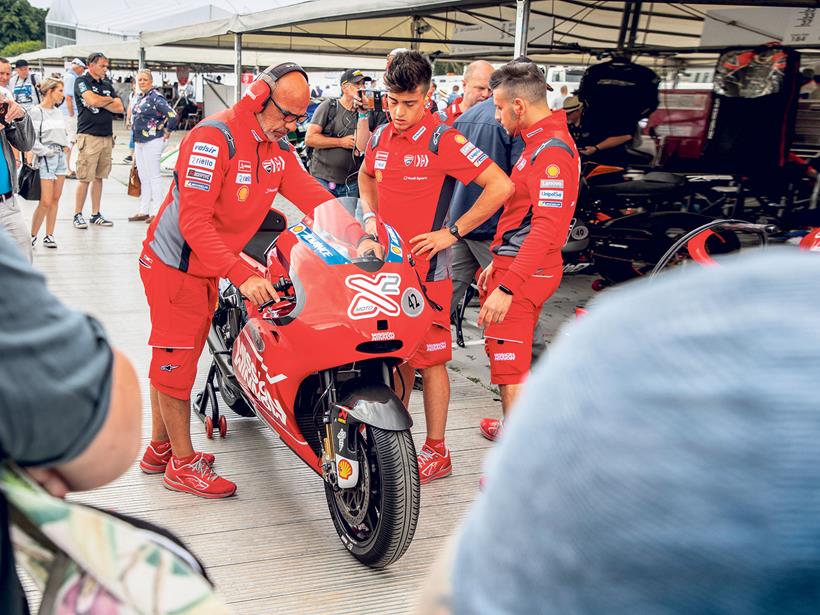 The Ducati team ready their GP12 pillion bike