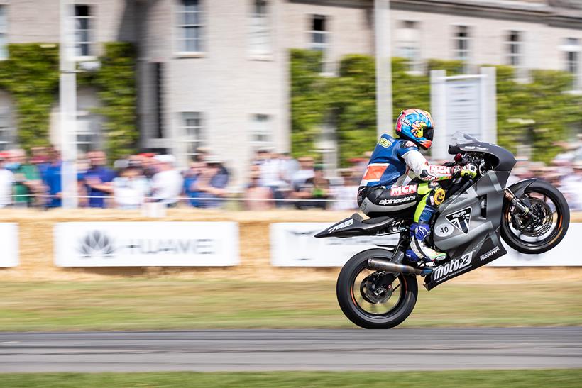 Michael Neeves wheelies the Moto2 Triumph