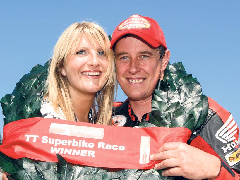 John McGuinness celebrating his 10th TT victory with Honda