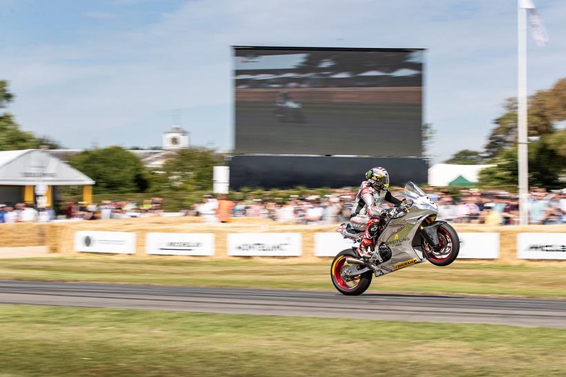 John McGuinness wheelie at the Festival of Speed