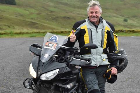 Motorcycling adventurer Nick Sanders awarded an MBE