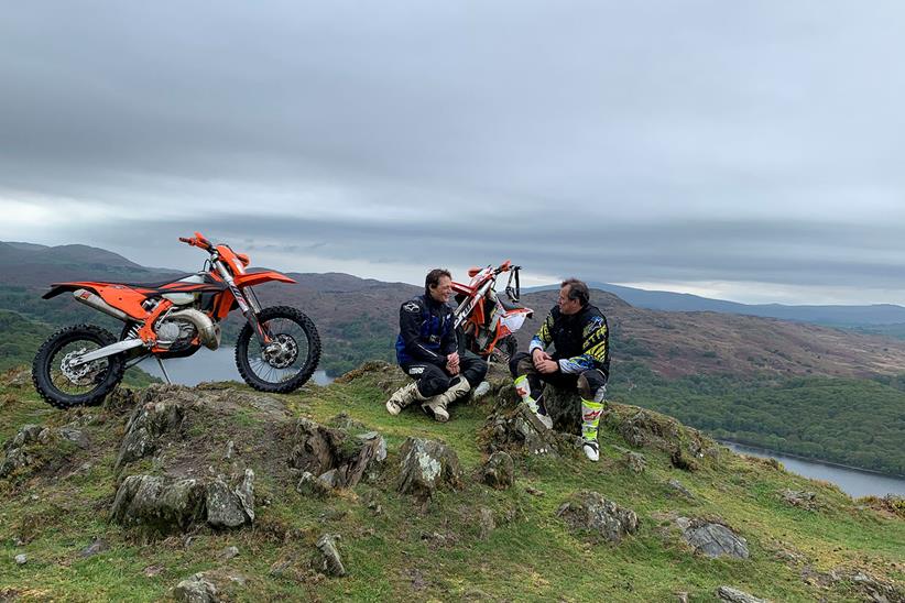 John McGuinness and Michael Guy take a break