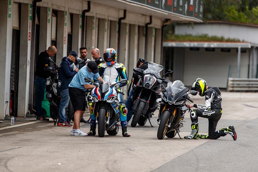 Preparing the superbikes for a session on track