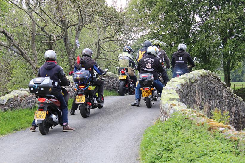 Northern Ningers cross a bridge