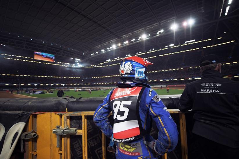 Polish rider Bartosz Zmarzlik with a marshal (photo credit: SpeedwayGP)