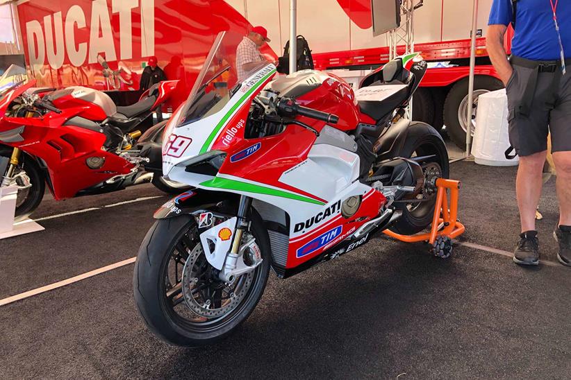 The bike features a 2013 MotoGP replica paint job