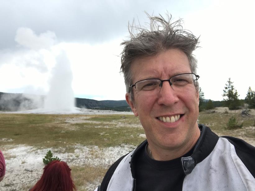 Simon in front of Old Faithful