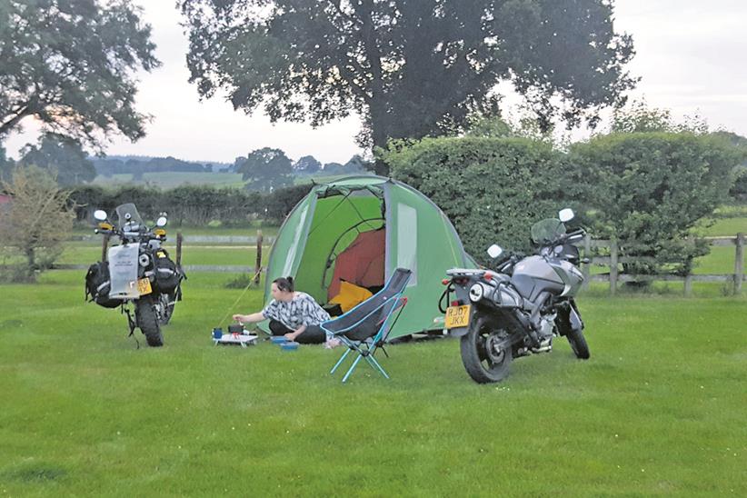 Martin and Clare Potts camping with motorbikes