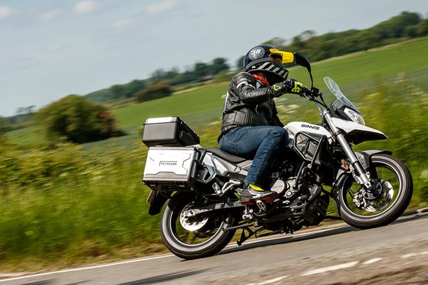 2005 Yamaha YBR 125cc riding down the road