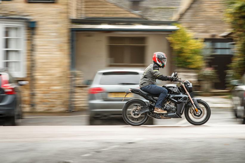 Zontes G1 Scrambler ridden through a town centre