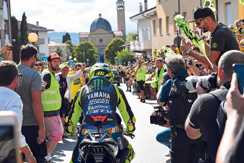 Valentino Rossi is cheered on by local fans