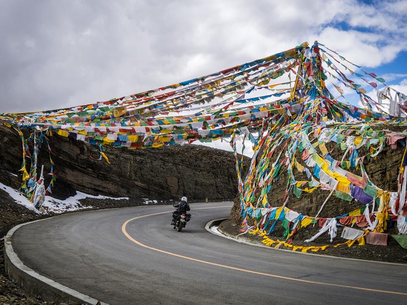 Flags line the road