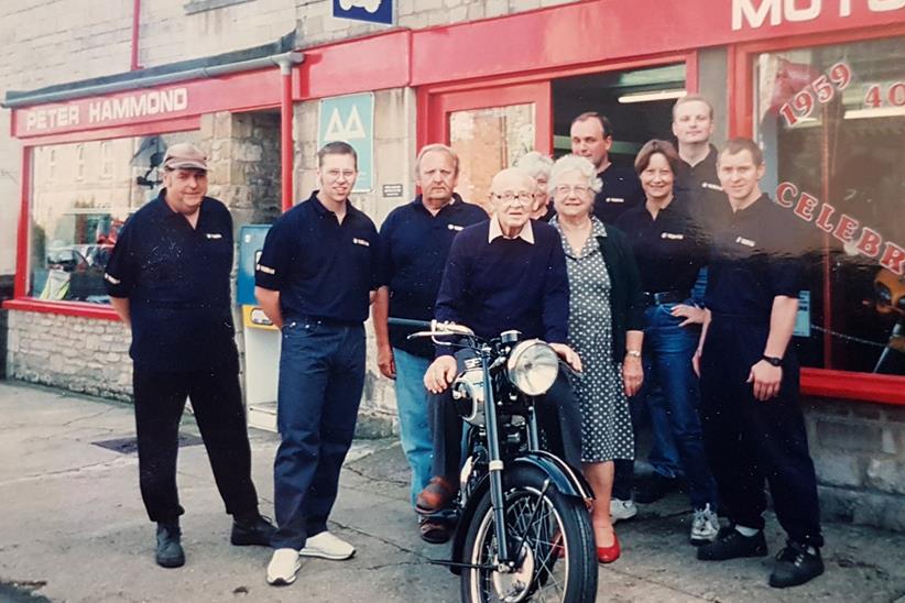 Posing for a photo outside the dealership