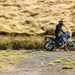 2022 Aprilia Tuareg 660 riding on a gravel trail