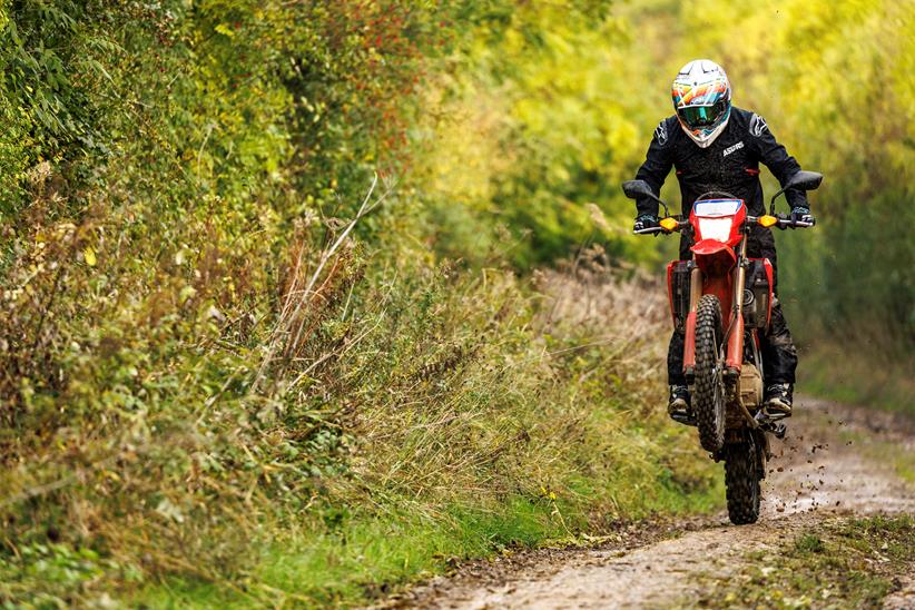 2023 Honda CRF300L riding down trail