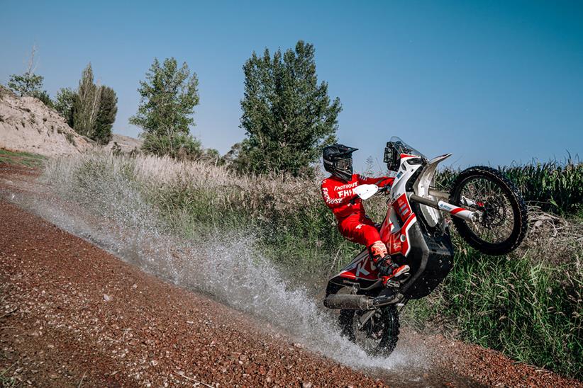 2024 Kove 450 Rally pulling a wheelie