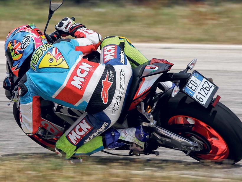 Knee down on the Aprilia Tuono V4 1100 Factory