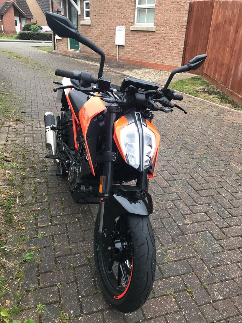 KTM 125 Duke sat outside the house