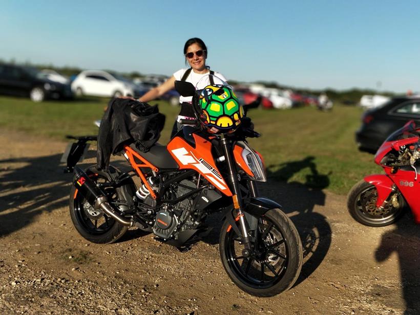 Maria and the KTM 125 Duke at Silverstone for the MotoGP