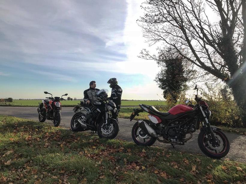 KTM 125 Duke enjoying the countryside with two other bikes