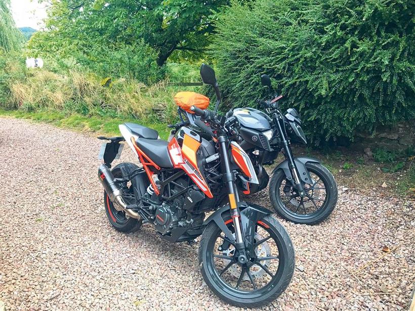 The KTM 125 Duke alongside a Yamaha MT-125