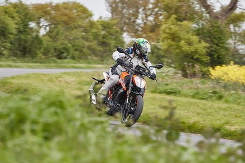 KTM 125 Duke flowing through the country