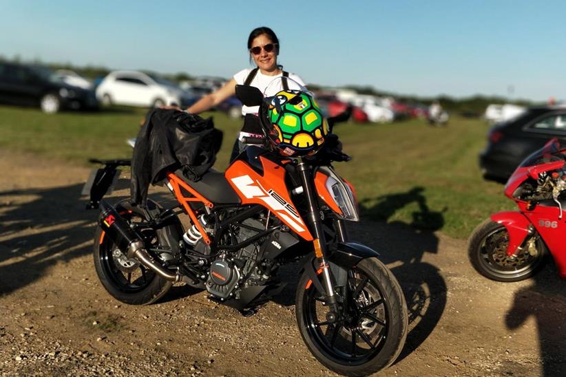 Maria and the KTM 125 Duke at Silverstone for the MotoGP