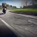 biker approaching UK potholes