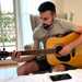 Eugene Laverty learns how to play the guitar