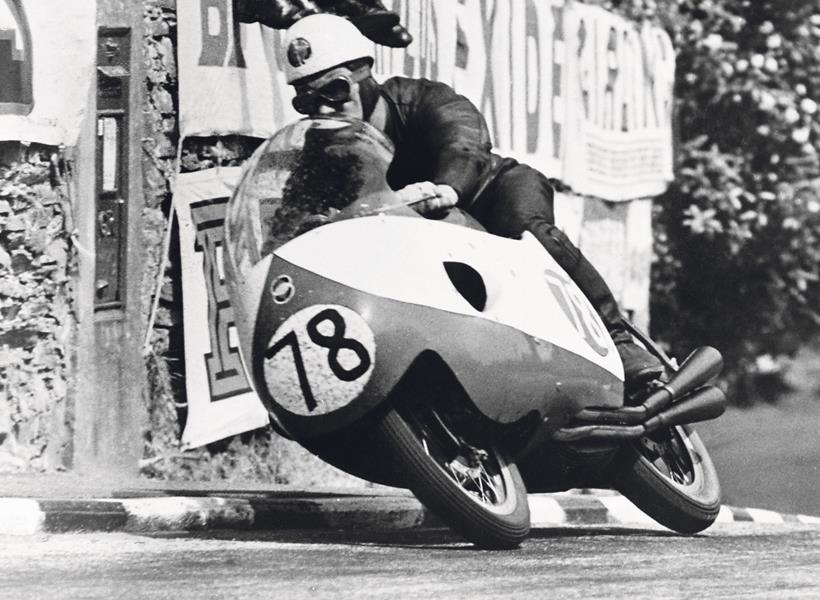 Bob McIntyre does the first 100mph TT lap