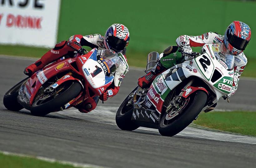 Colin Edwards and Troy Bayliss battle hard at Imola in 2002