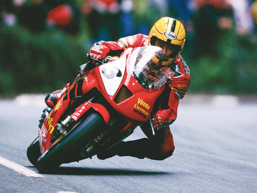 Joey Dunlop rides a Honda SP1