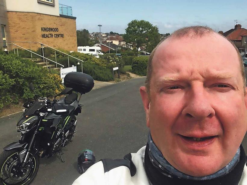 Richard Bentham delivers important packages on his Kawasaki Z900